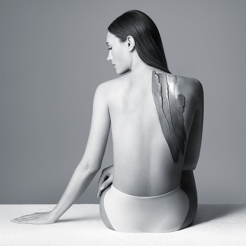 Comment exfolier le dos correctement sous la douche ?